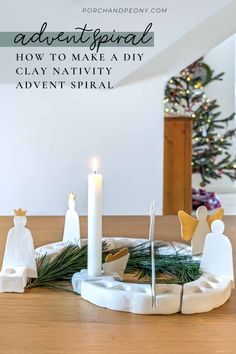 a nativity scene with candles and christmas decorations