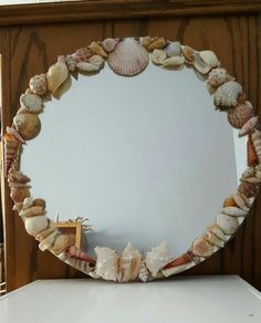 there is a mirror made out of seashells