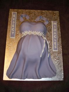 this is a cake that looks like a brides dress on it's side