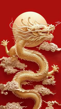 a golden dragon sitting on top of a red surface