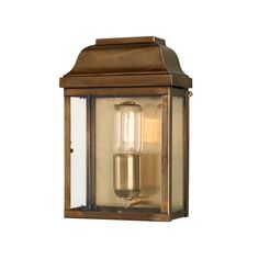 The Elstead Victoria Outdoor Coastal Wall Lantern Solid Brass is a stylish lighting solution that draws inspiration from pre-Georgian Britain. These period solid brass lantern designs have been taken from originals dating back to pre-Georgian Britain and will add style and class to town and country homes alike. Constructed from solid brass and glass, this outdoor wall lantern is robust and designed to withstand various weather conditions. The aged brass finish is lacquered for durability, enhancing its aesthetic appeal and adding a sleek and modern touch to the traditional design. The wall lantern accommodates a single E27 socket, capable of supporting a lamp with a maximum wattage of 100W. Please note, the lamp is not included. The clear glass panels elegantly diffuse the light, creating Garden Wall Lights, Lantern Designs, Wall Lanterns, Exterior Wall Light, Brass Lantern, Outdoor Wall Lantern, Outdoor Light, Antique Wall Clock, Luminaire Design