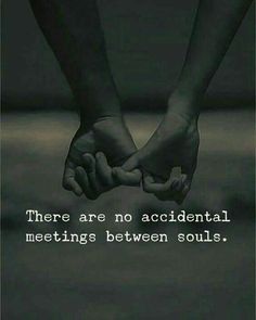 two hands holding each other with the words there are no accidentally meetings between souls