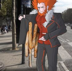 a man with red hair and beard holding a baguette in his hand while standing on the street