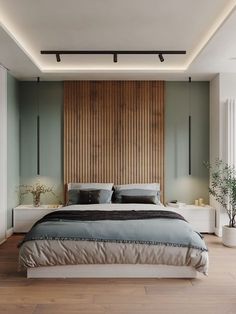 a large bed sitting in the middle of a bedroom next to a tall wooden headboard