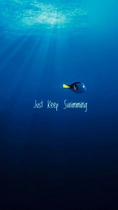 an underwater photo with the words just keep swimming