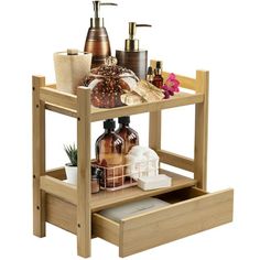 a wooden shelf with soaps, lotions and other items on top of it