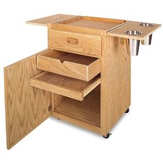 a wooden kitchen cart with drawers on wheels