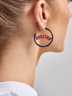 If the hoops are in, the game is on. The Houston Astros MLB Hoops feature sleek enamel in matching team colors to proudly frame the Houston name. Fastened with a post back closures, these earrings are ready to take down the competition. This is an officially licensed MLB product. Houston Astros, Team Colors, The Game, Mlb, Houston, Hoop Earrings, Sleek, Frame