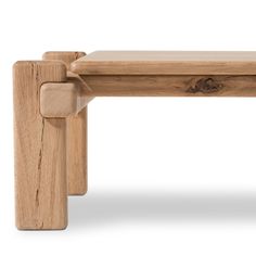 a wooden bench with two legs on it