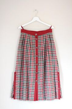 Retro frilly skirt from 1970s with check pattern / Folk skirt / Vintage country girl mid calf length skirt * size LargeFolk skirt with red and green check pattern and decorated with big buttons in the front and sides. This vintage broomstick skirt will be perfect for country styled outfits. Additionally, it will look good in boho/hippie style.Has a lot of pleats (a lot of material was used to create this skirt) and reaches to mid-calf/ankle - depends how tall you are. Please check measurements b Vintage Plaid Full Skirt, Vintage Plaid Summer Skirt, Vintage Plaid Cotton Skirt, Vintage Pleated Plaid Skirt, Folk Skirt, Calf Length Skirt, Broomstick Skirt, Frilly Skirt, Dark Blue Sweater