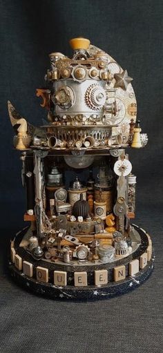 a clock made out of various types of mechanical parts, including gears and other things