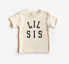 Elevate sisterly love with our Little Sis Natural Shirt, crafted for little sisters who bring joy and laughter to every moment. Made from soft and eco-friendly cotton, this shirt offers comfort and sustainability in one. The natural color adds a timeless and versatile look to their wardrobe, perfect for family gatherings, special occasions, or casual outings. Key Features: Soft and Eco-Friendly Cotton: Ensures comfort and sustainability. Charming Design: Celebrates the special bond of sisterhood Little Sister Shirt, Sisterly Love, Big Sister Little Sister, Lil Sis, Sister Outfits, Nature Color Palette, Matching Outfit, Sister Shirts, Stretch Shorts