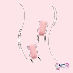 three toothbrushes are arranged in the shape of ladders on a pink background