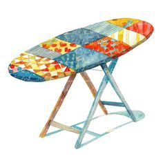 an ironing board with multicolored designs on it's top and legs