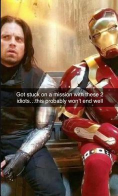 two men sitting next to each other wearing iron man costumes