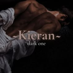 a man laying on top of a bed covered in white sheets with the words keran