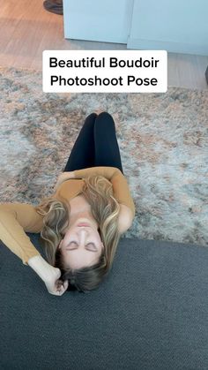 a woman laying on the floor with her head down