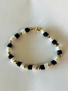 Round Beaded Bracelets Ideas, Clay Bead Bracelet Ideas Minimalist, Dark Clay Bead Bracelet, Homemade Bracelets For Boys, Clay Bead Bracelet Ideas Black And Gold, Basic Clay Bead Bracelet, Bracelet Designs Clay Beads, Soccer Clay Bead Bracelet, Elegant Clay Bead Bracelets