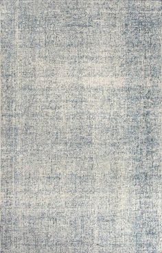 a blue and white area rug with an overdy pattern on the bottom half of it