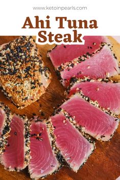 ahi tuna steak on a cutting board with sesame seeds