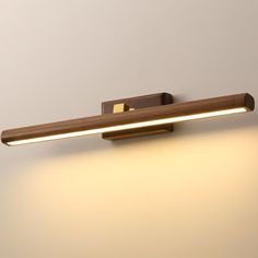 an image of a bathroom light that is in the shape of a rectangular wall lamp