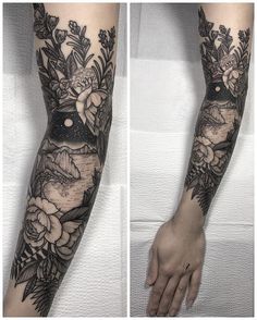 the arm is covered in black and white flowers