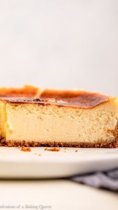 a piece of cheesecake on a white plate