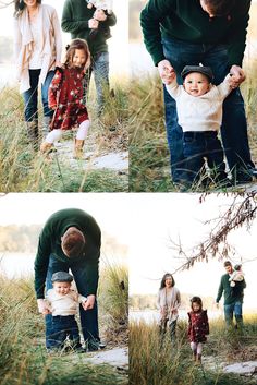 a family is walking through tall grass with their toddler's hands in the air