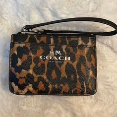 Nwot Coach Key And Cardholder Pouch. 2 Outside Card Pockets Plus An Id Slot. Zippered Pocket And Key Ring. Goregous Chetah Print With Logo. Coach Coin Purse With Removable Pouch, Bags Coach, Wristlet Keychain, Christmas Wishlist, Key Ring, Key Rings, Coach Bags, Zipper Pocket, Black And Brown