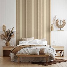 a large bed sitting next to a wooden table on top of a hard wood floor