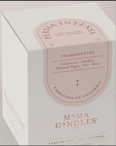 a white box with pink label on the front and inside that says, mama candles