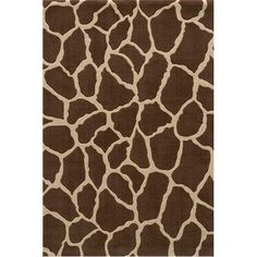 a brown and white rug with giraffe print