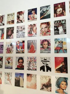 the wall is covered with many different magazine covers on it's sides and features photos of women