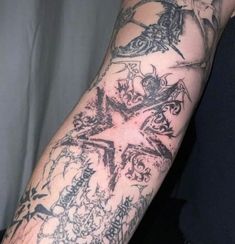 a person with a tattoo on their arm