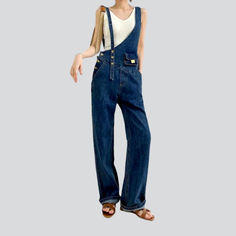 Step into the spotlight with our 90s-inspired asymmetric straight women's denim jumpsuit from the 2023 Spring Collection. Crafted with a established medium wash. this timeless piece is perfect for those seeking a modern. fashionable look.Distinctive Features: Straight Silhouette: With a straight form and uneven design. this jumpsuit flatters your figure. offering a chic look with a traditional appeal. Medium Wash: The medium wash gives it a versatile appeal. allowing for a seamless transition fr Chic Dark Wash Straight Leg Denim Jumpsuit, Non-stretch High Waist Dark Wash Denim Jumpsuit, Trendy Denim Blue Wide-leg Jumpsuit, Trendy Denim Blue Wide Leg Jumpsuit, Trendy Wide Leg Denim Jumpsuit, Chic Denim Overall Jumpsuit, Denim Blue Straight-leg Jumpsuit For Summer, Trendy Dark Wash Wide-leg Romper, Trendy Dark Wash Wide Leg Jumpsuits