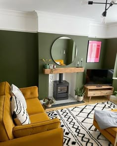 a living room filled with furniture and a fire place next to a mirror on the wall