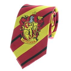 Premium Harry Potter Tie Striped House Crest Necktie Neckwear Tie Cosplay Costume Wizarding World (Gryffindor) Being a wizard in a muggle world is boring. So it's time to spruce up your daily attire by adding a little house color. These officially licensed Harry Potter Hogwarts house costume neck ties feature the four house crests; Gryffindor, Slytherin, Ravenclaw, and Hufflepuff. Made of soft polyester fabric, embroidered house crest. Use as part of your cosplay, Halloween costume or wear them Harry Potter Tie, House Costume, Embroidered House, Slytherin Ravenclaw, Harry Potter Hogwarts Houses, Gryffindor Slytherin, House Color, Hogwarts Houses, Cosplay Halloween