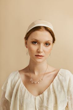 Discover the captivating beauty of the Lumea Necklace. This exquisite piece of jewelry is meticulously handcrafted to showcase the allure of glass art. The necklace features a stunning clear glass pendant, reminiscent of glistening ocean waves, suspended from a delicate chain. The Lumea collection is inspired by the elements of water, evoking a sense of tranquility and elegance. Each necklace is carefully crafted with attention to detail, making it a unique and cherished accessory. This necklace is a perfect blend of sophistication and versatility. It effortlessly complements both casual and formal outfits, adding a touch of refinement to your style. Whether worn for everyday occasions or special events, the Lumea ClearNecklace is sure to attract attention and become a conversation starter Elegant Glass Drop Jewelry, Elegant Drop Glass Jewelry, Elegant Drop-shaped Glass Jewelry, Elegant Crystal Necklaces With Pearl Drop, Elegant Teardrop Beaded Necklaces, Elegant Briolette Crystal Necklace, Elegant Clear Drop Jewelry, Clear Drop Jewelry For Wedding, Elegant Clear Drop-shaped Jewelry