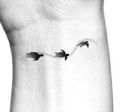 three birds flying through the air on a woman's right side ribcage