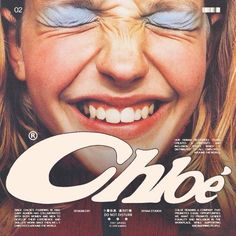 a woman with blue eyes and white makeup on the cover of an article in magazine