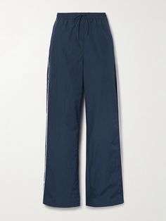 Nike's track pants are reminiscent of popular retro styles. Made from shell, they have a comfortable drawstring waist and white piping along the sides that match the embroidered 'Swoosh' logo. Team yours with the coordinating jacket. Denim Flats, Nike Track Pants, Volleyball Pictures, Retro Styles, Sport Swimwear, Stockholm Fashion, Swoosh Logo, Nike Outfits, Ski Wear