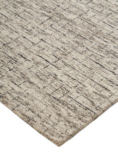 an area rug with grey and white colors on the top, in front of a white background