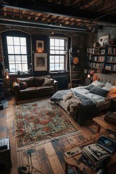 a bedroom with a bed, couch and bookshelf