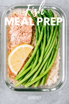 salmon, asparagus and rice in a meal prep container with the words fish meal prep