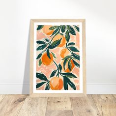 an orange tree with green leaves and peaches on a pink background in a wooden frame