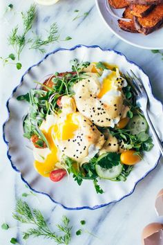 a plate with eggs and vegetables on it