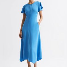 Reiss Blue Elani Midi Dress Women’s 12 New With Tags Cross Back Cinched Waist. The Blue Elani Midi Dress Is Crafted From A Fluid Fabrication That’s Slightly Cinched At The Waist To Accentuate The Natural Frame. Cap Sleeves Are Added For Femininity, Alongside A Subtle Pleat To The Chest. The Reverse Features A Cross-Back Detail. Crew Neckline. Pleat To Front. Capped Sleeves. Cross-Back Detail. Side Slip Pockets. Zip To Reverse. Midi Length Relaxed Fit. Main 97% Viscose, 3% Elastane. Lining 100% P Blue Midi Dress With Button Closure, Luxury Blue Short Sleeve Midi Dress, Blue Midi-length Breezy Maxi Dress, Breezy Blue V-neck Midi Dress, Blue Viscose V-neck Midi Dress, Cap Dress, Cinched Waist, Sleeves (women), Womens Midi Dresses