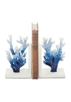 two bookends with blue coral on them