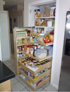 the pantry is stocked with all kinds of food