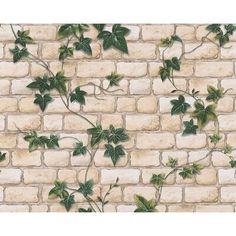 a brick wall with green leaves on it